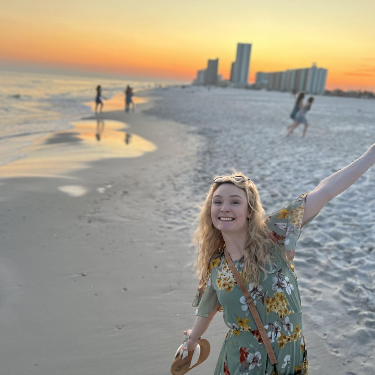 Danielle Lancaster, the baker behind Something Sour, on the beach at sunset