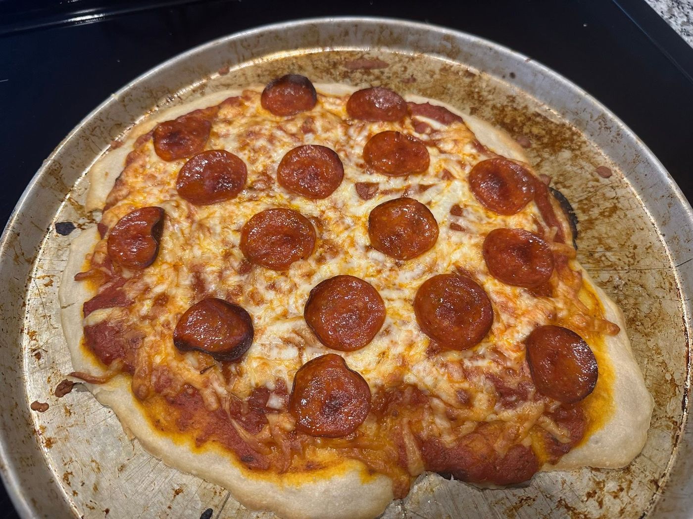 Sourdough crust pepperoni pizza