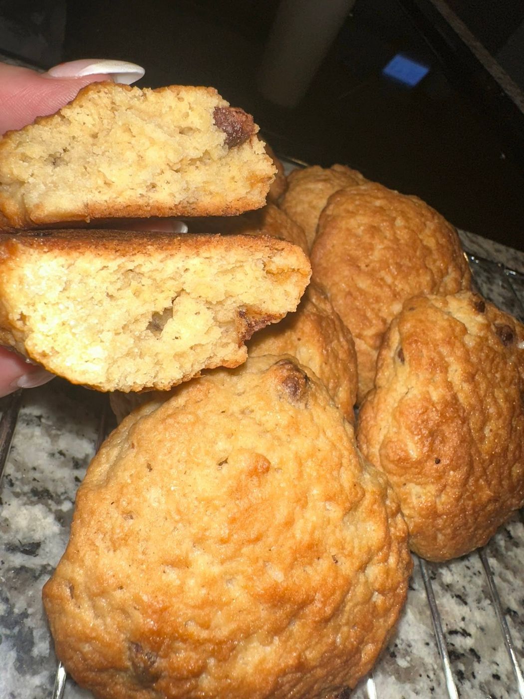 Golden baked goods with one broken open